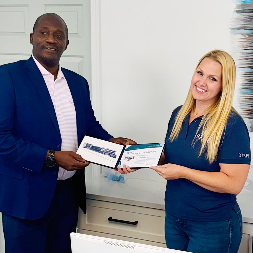 Meagan Goin being awarded the Hometown Heros award.