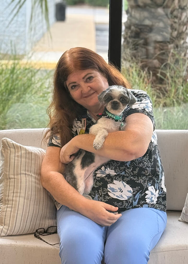 September 2025 adoption of Domino also known as Nala a little gray and white dog