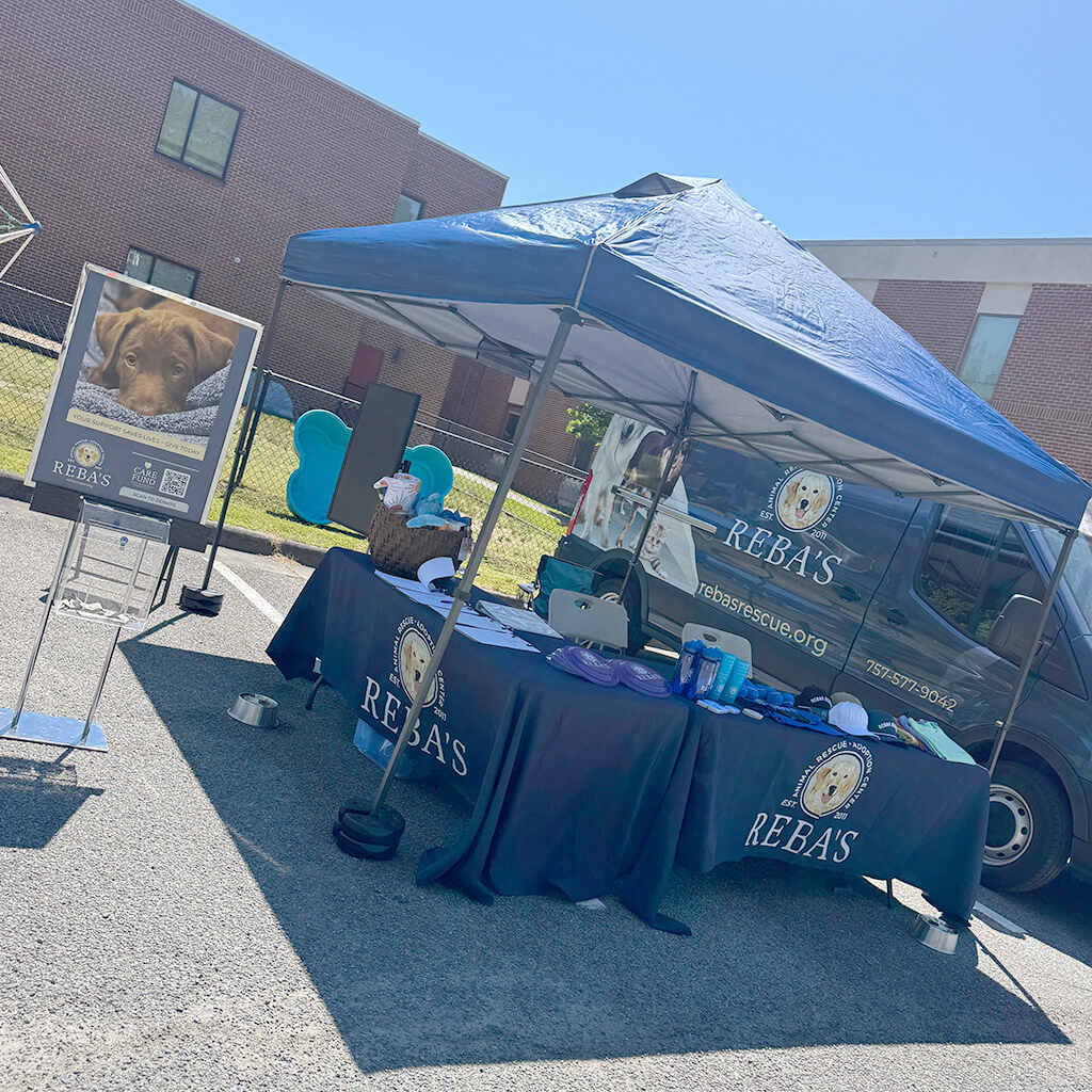 Rebas booth set up at Blessing of the pets