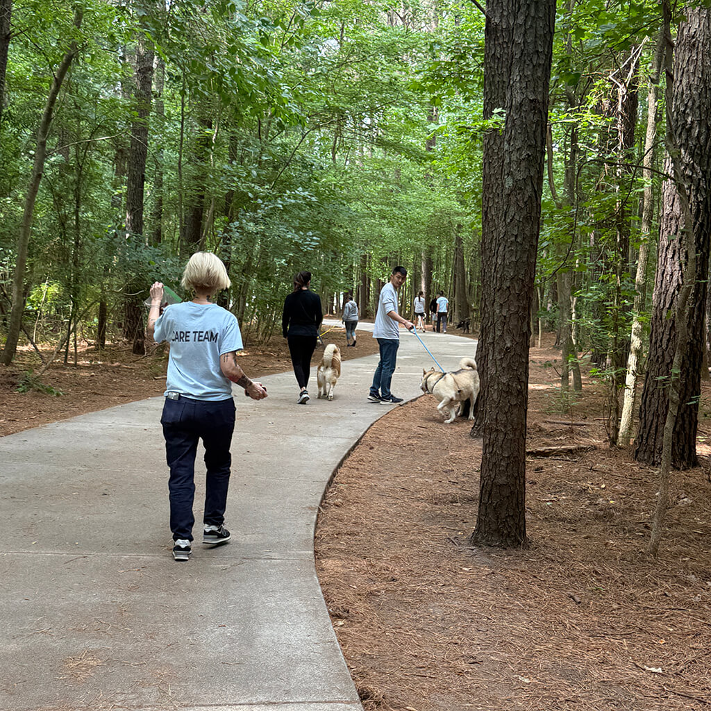 May 8th Road Trip with the Coast Guard - walking in the woods with the dogs