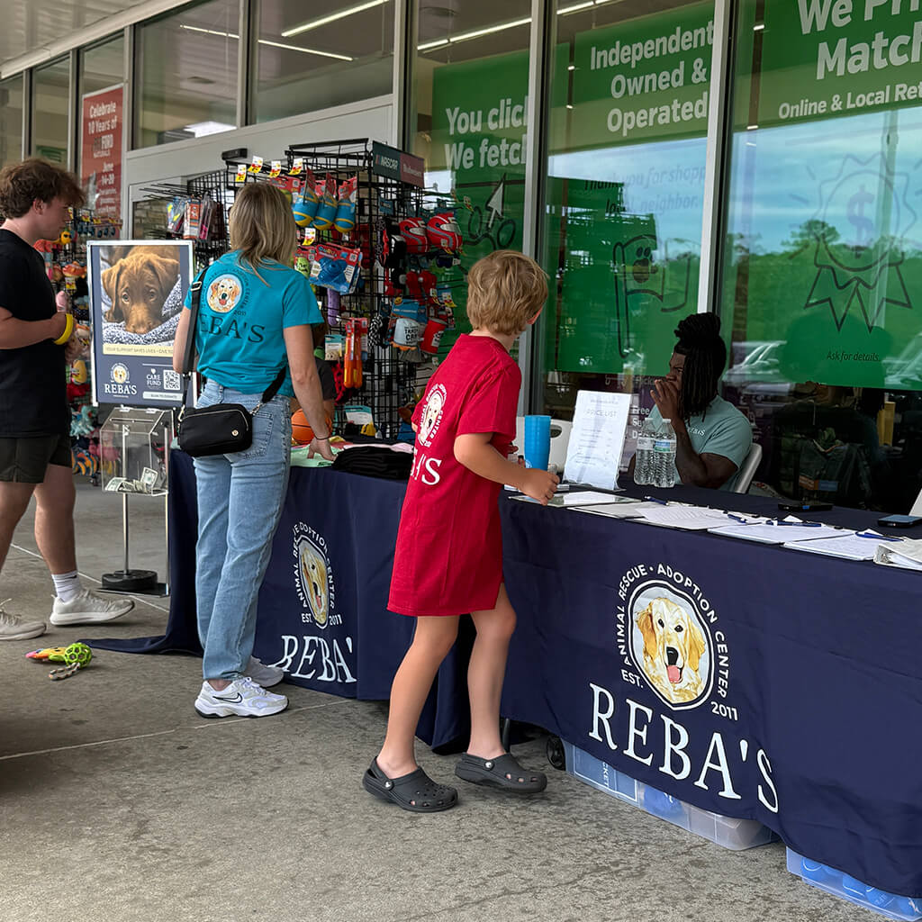 Rebas table outside Pet Supplies Plus
